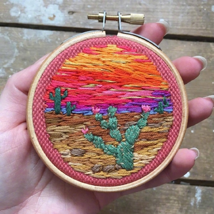 精致的刺绣风景画图片