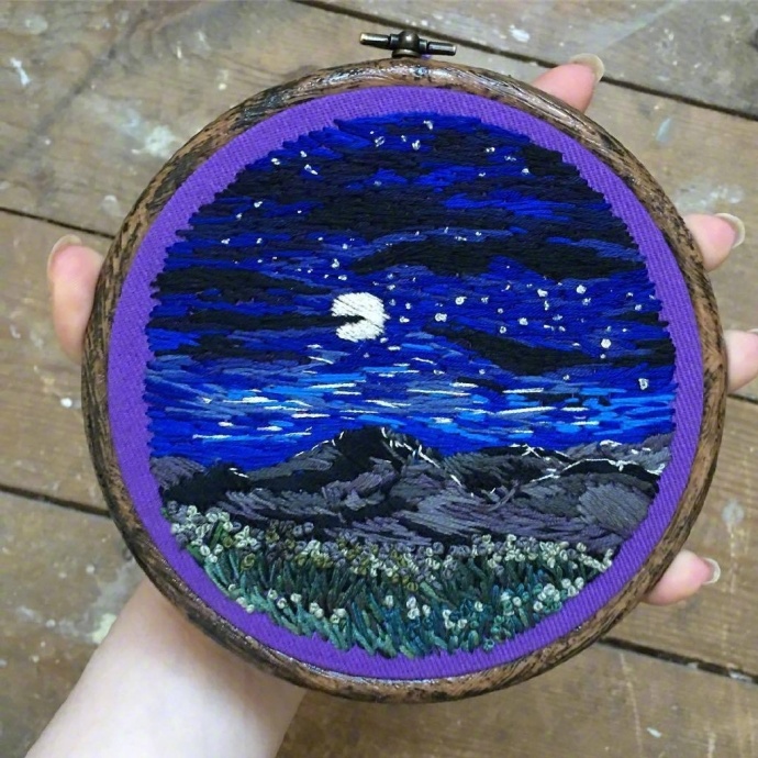 精致的刺绣风景画图片