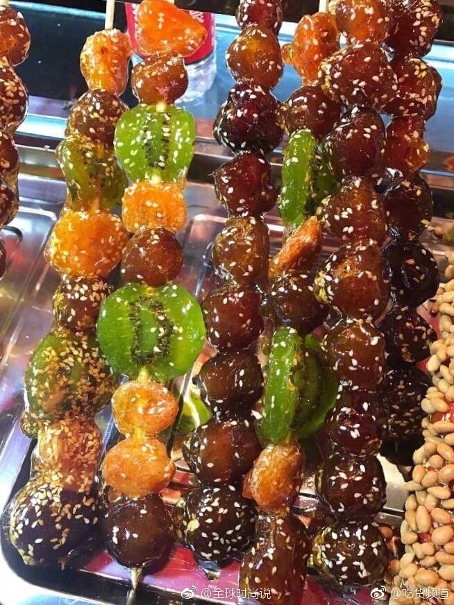 冬天里有一种小吃叫冰糖葫芦图片