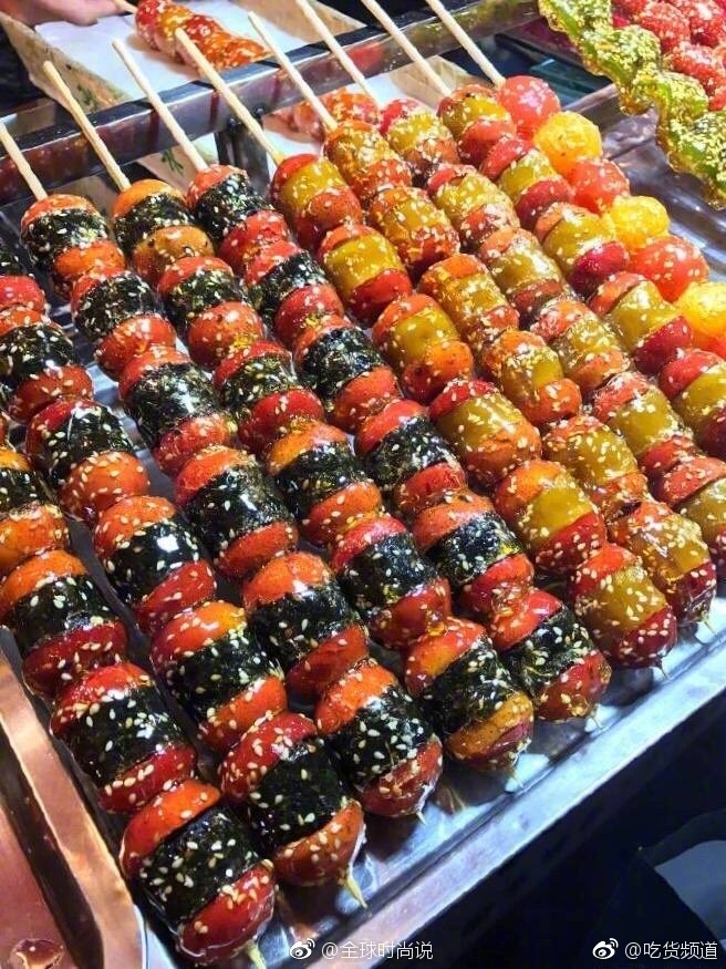 冬天里有一种小吃叫冰糖葫芦图片