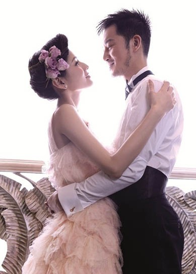 中国明星夫妻沙溢胡可婚纱照图片