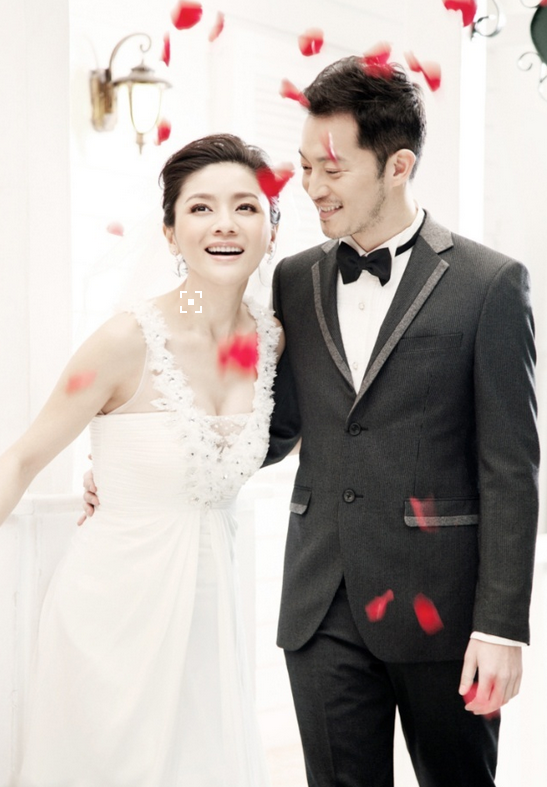中国明星夫妻沙溢胡可婚纱照图片