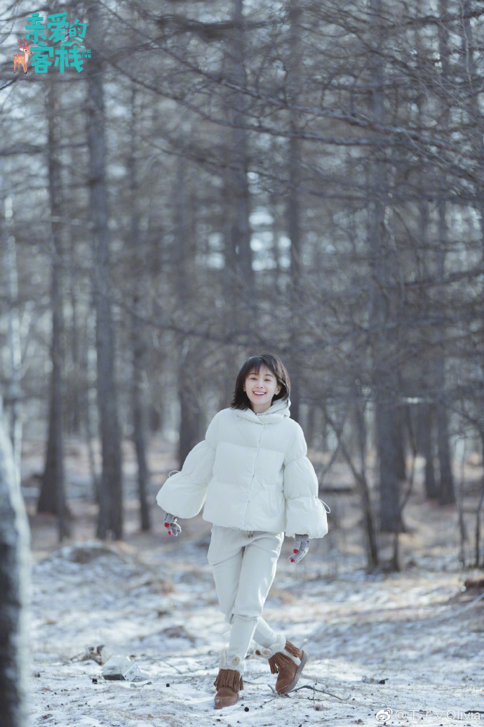 中国美女明星王子文白色羽绒服唯美写真图片